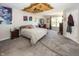 Spacious bedroom with large window and plush carpeting at 4620 Whitham Ln, Indianapolis, IN 46237