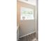 Small bathroom with window and vinyl flooring at 4620 Whitham Ln, Indianapolis, IN 46237