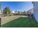 Spacious backyard with a patio, shed, and well-manicured lawn at 4620 Whitham Ln, Indianapolis, IN 46237