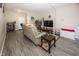 Comfortable living room with ample space and a flat-screen TV at 4620 Whitham Ln, Indianapolis, IN 46237