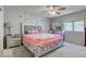 Bedroom with a queen bed, nightstand and window at 7932 Eagle Valley Pass, Indianapolis, IN 46214