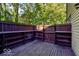 Private deck with built-in wooden benches at 7932 Eagle Valley Pass, Indianapolis, IN 46214