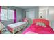 Charming bedroom with two twin beds, window, and closet at 7932 Eagle Valley Pass, Indianapolis, IN 46214