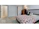 Bedroom with double closets and plush carpeting at 7932 Eagle Valley Pass, Indianapolis, IN 46214