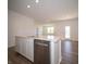 Open concept kitchen with island and stainless steel appliances at 231 Lar Lan Dr, Danville, IN 46122
