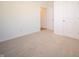 Bedroom with neutral carpeting and double door closet at 231 Lar Lan Dr, Danville, IN 46122