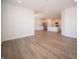 Open living room with hardwood floors and kitchen views at 231 Lar Lan Dr, Danville, IN 46122