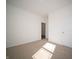 Well-lit bedroom with neutral carpeting and double door closet at 231 Lar Lan Dr, Danville, IN 46122