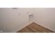 Small laundry area with vinyl flooring and built-in shelving at 231 Lar Lan Dr, Danville, IN 46122