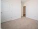 Simple bedroom with neutral carpeting and double door closet at 231 Lar Lan Dr, Danville, IN 46122