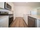 Modern kitchen with stainless steel appliances and white cabinetry at 231 Lar Lan Dr, Danville, IN 46122
