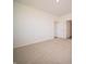 Simple bedroom with neutral carpet and access to a hallway at 231 Lar Lan Dr, Danville, IN 46122
