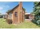 Brick home with awning covered porch and landscaped yard at 532 E Mills Ave, Indianapolis, IN 46227