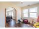 Playroom with hardwood floors, rocking chair, and plenty of natural light at 532 E Mills Ave, Indianapolis, IN 46227