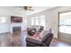 Living room with hardwood floors, fireplace, and comfortable seating at 532 E Mills Ave, Indianapolis, IN 46227