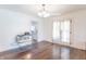 Dining room with hardwood floors and French doors leading to backyard at 532 E Mills Ave, Indianapolis, IN 46227