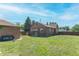 Spacious backyard with grassy area and a view of the home at 532 E Mills Ave, Indianapolis, IN 46227