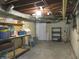 Unfinished basement with shelving for storage at 431 Vestal Rd, Plainfield, IN 46168