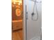 White shower with safety bar and tiled floor at 431 Vestal Rd, Plainfield, IN 46168
