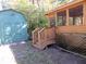 Wooden stairs leading to a screened porch and green shed at 431 Vestal Rd, Plainfield, IN 46168