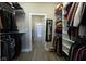 Large walk-in closet with shelving and hanging rods at 6611 Ventnor Pl, Indianapolis, IN 46217