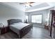 Spacious bedroom with large window and hardwood floors at 6611 Ventnor Pl, Indianapolis, IN 46217