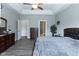 Main bedroom with access to bathroom and walk-in closet at 6611 Ventnor Pl, Indianapolis, IN 46217