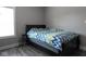 Bright bedroom with a double bed and gray flooring at 6611 Ventnor Pl, Indianapolis, IN 46217