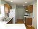 Bright kitchen with wood cabinets, gas range, and stainless steel appliances at 535 E Merrill St, Indianapolis, IN 46203