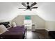 Large bedroom with a king bed and sloped ceilings at 1938 E 11Th St, Indianapolis, IN 46201