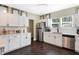Modern kitchen with white cabinets, stainless steel appliances, and quartz countertops at 1938 E 11Th St, Indianapolis, IN 46201