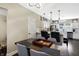 Bright dining area with a farmhouse table and modern lighting at 1938 E 11Th St, Indianapolis, IN 46201