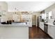 Modern kitchen with white cabinets, stainless steel appliances, and a kitchen island at 1938 E 11Th St, Indianapolis, IN 46201