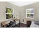 Home office with a desk, chair, and plenty of natural light at 1938 E 11Th St, Indianapolis, IN 46201