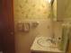 Simple bathroom with sink and toilet at 610 W Monroe St, Alexandria, IN 46001