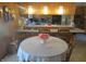 Charming kitchen dining area with a round table and chairs at 610 W Monroe St, Alexandria, IN 46001