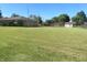 Large backyard with a chain link fence at 610 W Monroe St, Alexandria, IN 46001