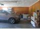 Two-car garage with ample space and wood-paneled walls at 610 W Monroe St, Alexandria, IN 46001