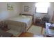 Quiet bedroom with a double bed and wood floors at 610 W Monroe St, Alexandria, IN 46001