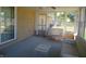 Sunroom with seating and a view of the backyard at 610 W Monroe St, Alexandria, IN 46001