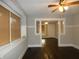 Living room with hardwood floors and built-ins at 305 Leeds Ave, Indianapolis, IN 46201