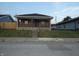 House with brick facade, steps, and a front yard at 305 Leeds Ave, Indianapolis, IN 46201