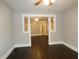 Dining room with hardwood floors and view to kitchen at 305 Leeds Ave, Indianapolis, IN 46201
