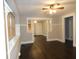 Living room with hardwood floors and built-ins at 305 Leeds Ave, Indianapolis, IN 46201