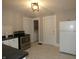Kitchen with white cabinets and stainless steel appliances at 305 Leeds Ave, Indianapolis, IN 46201