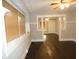 Living room with hardwood floors and built-ins at 305 Leeds Ave, Indianapolis, IN 46201