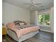 Main bedroom with shiplap wall and a king-size bed at 2838 Silverwood Ln, Greenwood, IN 46143