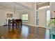 Spacious dining room with hardwood floors and large window at 2838 Silverwood Ln, Greenwood, IN 46143