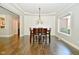 Formal dining room featuring hardwood floors and shiplap wall at 2838 Silverwood Ln, Greenwood, IN 46143