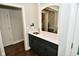 Dark-grey wet bar with quartz countertop and sink at 2838 Silverwood Ln, Greenwood, IN 46143